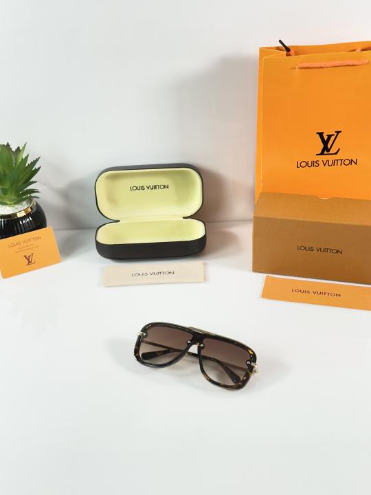Louiss_Vuitton_1918_Gold_Tiger_Brown