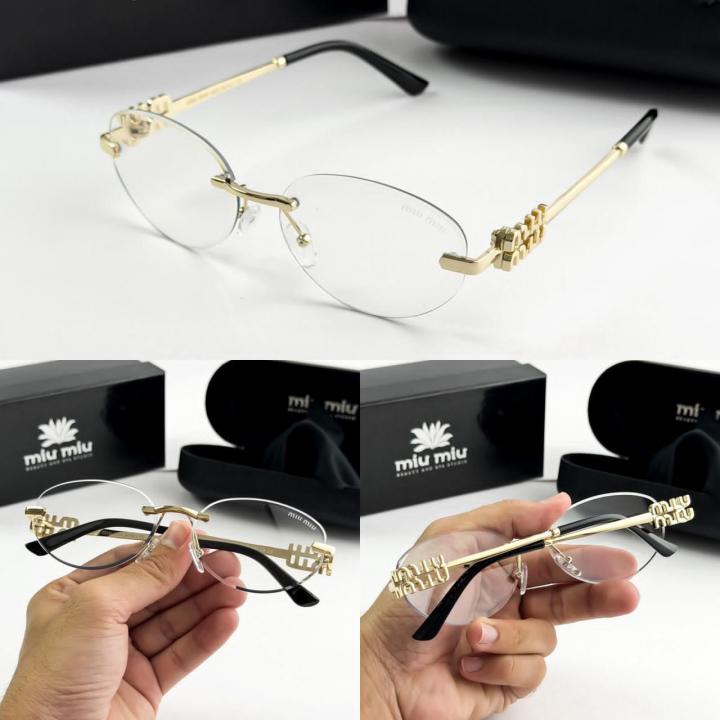 MIU MIU gold frame 1025