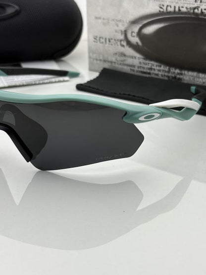 Oakle.y 9495 blue black prizm polarized lens